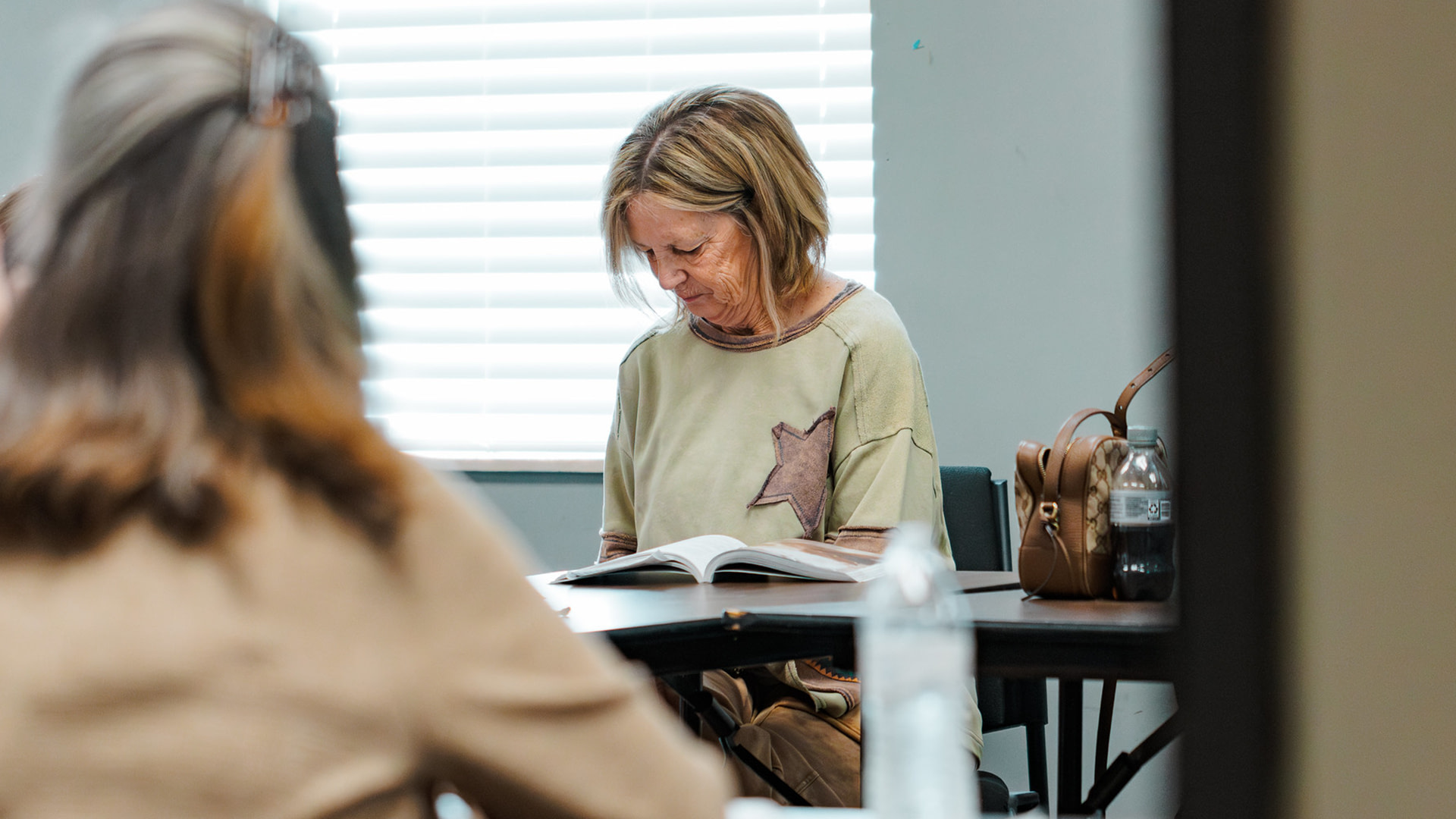 Woman reading her Bible Study