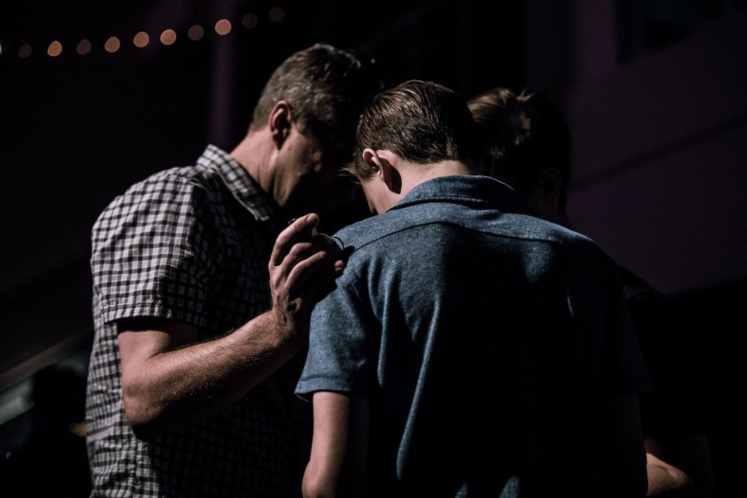 Two people praying.
