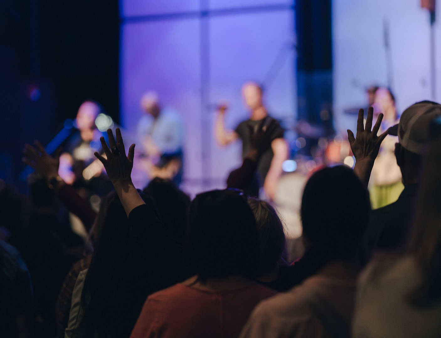 Woman singing during worship service