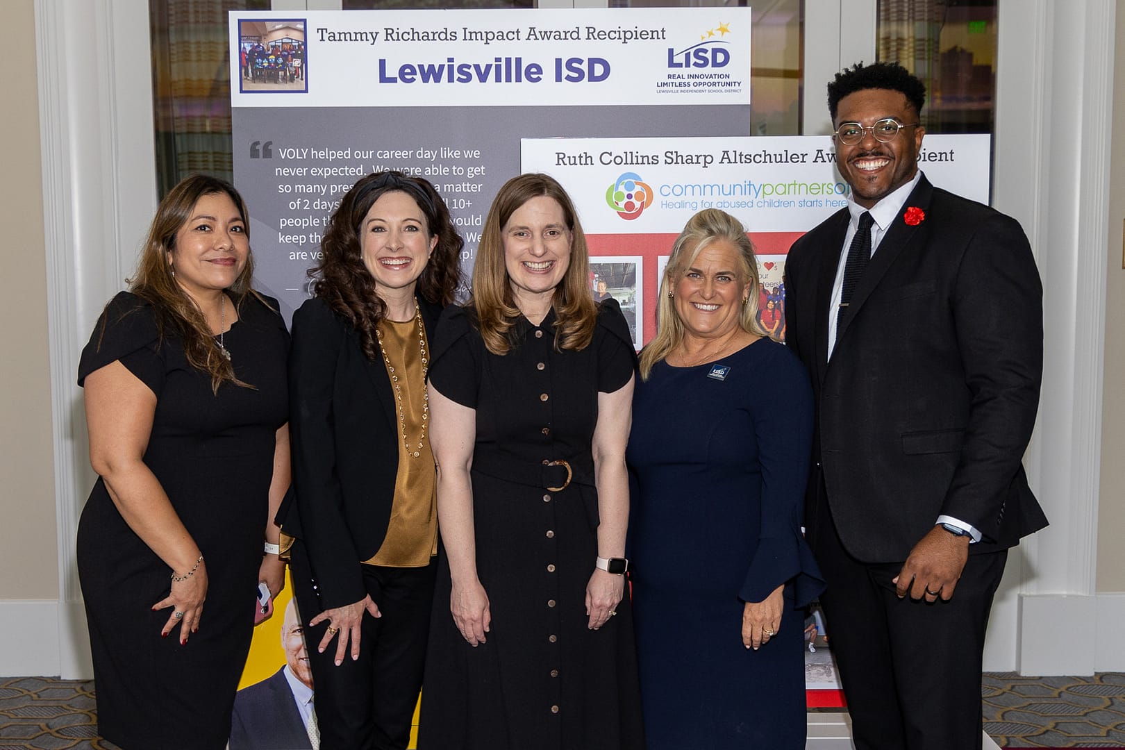 Group of people at Lewisville ISD award event.