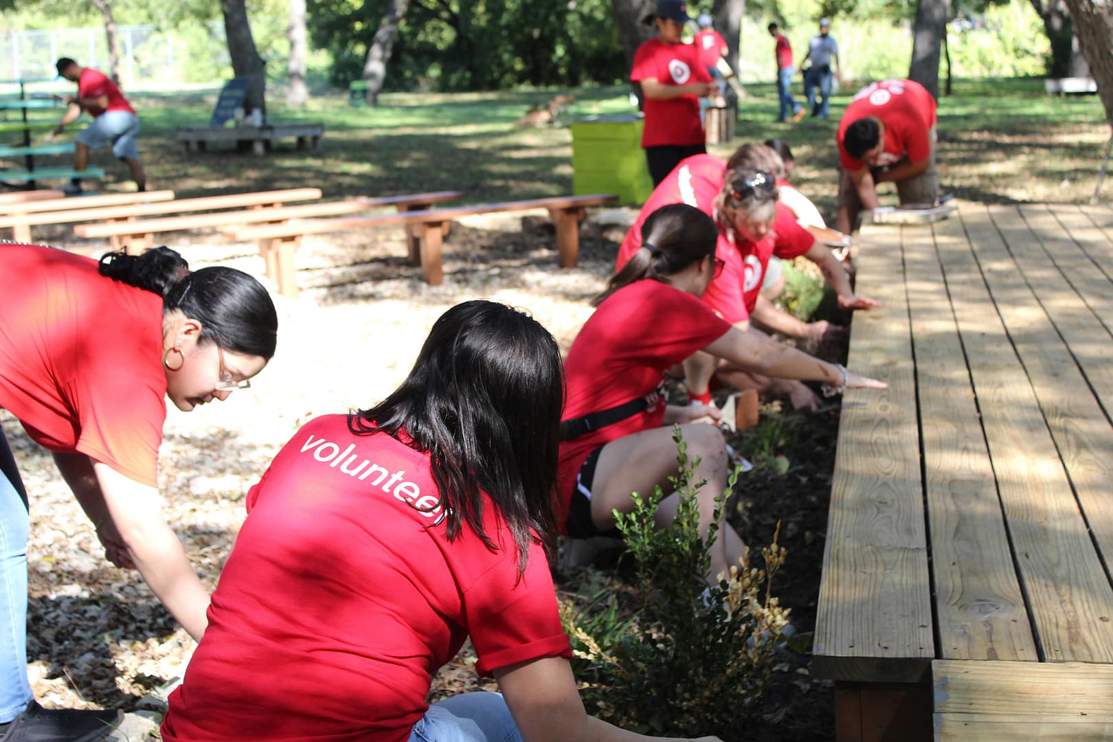 Volunteers working on a community project in a park.