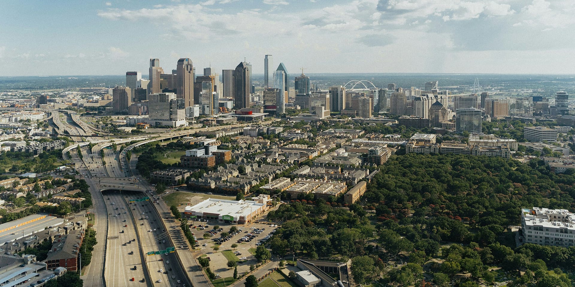 Aerial view of Dallas skyline and highways.