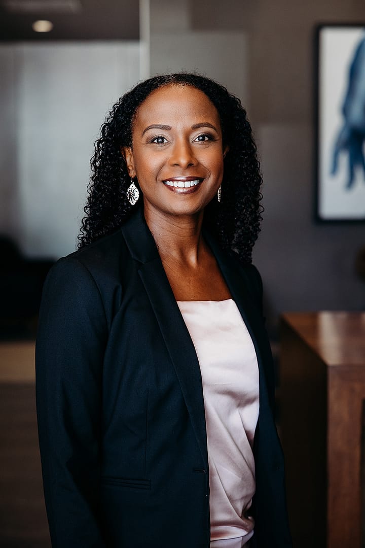 Professional woman smiling in office setting