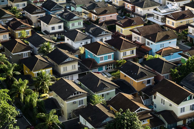 Aerial view of colorful suburban houses.