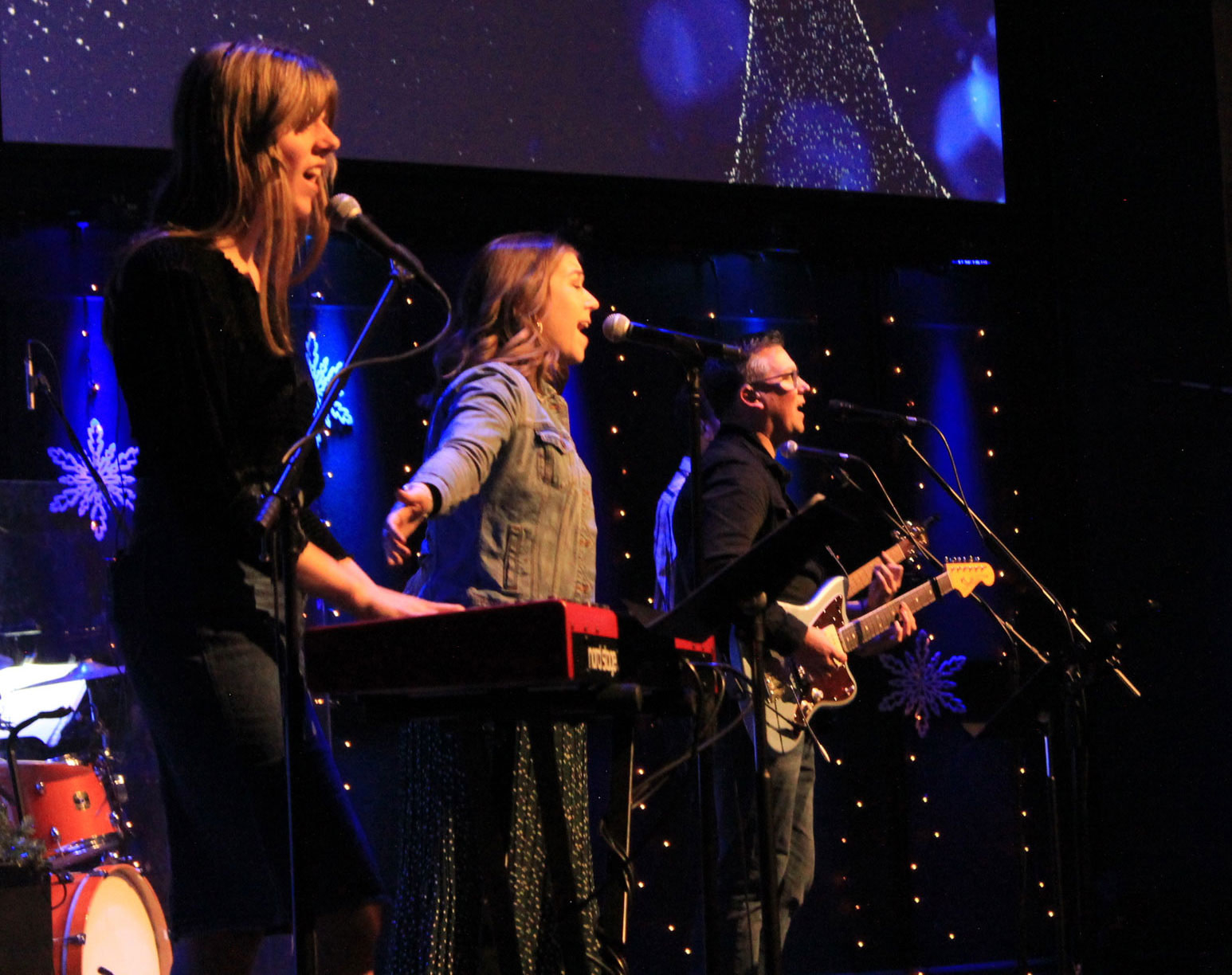 Woman singing during worship service